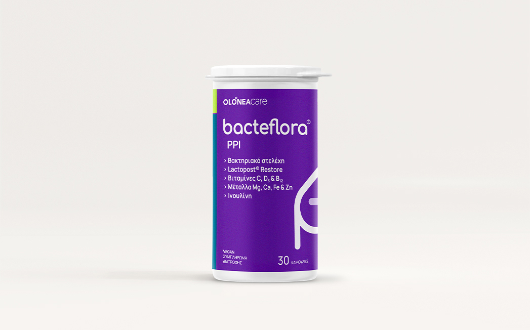 Purple probiotic bottle labeled 'bacteflora PPI' with a white cap, 30 capsules, on a white surface.