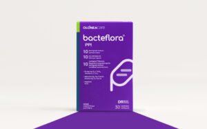 Bacteflora PPI purple supplement box on a white surface with teal side panel, 30 capsules indicated at bottom right (product packaging).”,