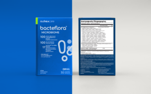 Blue bacteflora Microbiome probiotic box (front) with white text, left side of image showing the packaging against a blue background, 30 capsules noted.