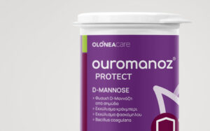 Purple bottle of OLonEacare ouromanoz Protect D-MANNOSE dietary supplement with Greek text on the label and a white cap.
