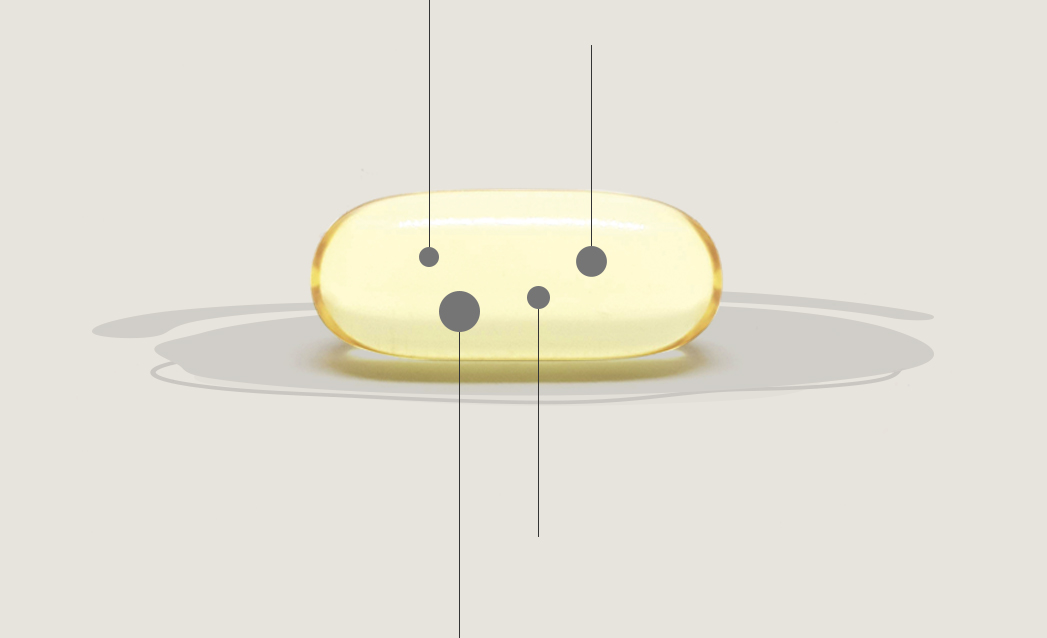 Annotated diagram of a yellow capsule with gray dots and measurement lines marking four points on the pill surface.